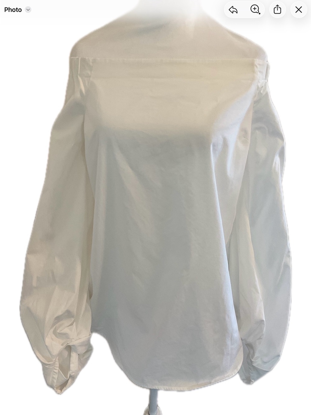 Aritzia Babaton White Blouse with Off-Shoulder blouse with balloon sleeves.